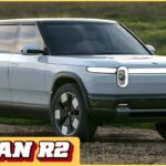 Rivian R2 compact electric SUV parked in an urban setting in 2026