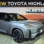 Toyota Highlander Electric SUV 2026 charging at urban station, premium three-row family EV with 515 km range, ideal for India and US buyers