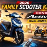 Honda Activa 125 H-Smart variant parked on an Indian street, showcasing LED headlamp and alloy wheels